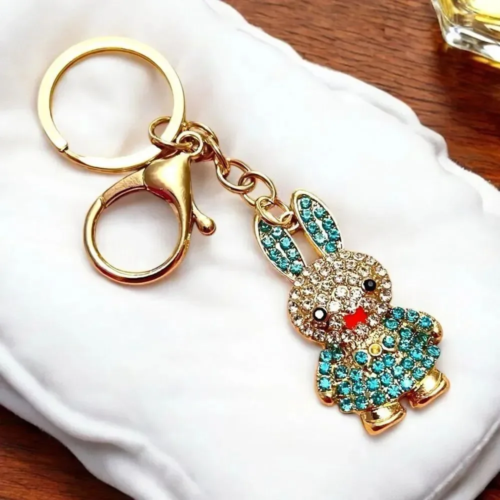 ⭐️3/$25⭐️ White and Teal Rhinestone Bunny Gold Tone Keychain